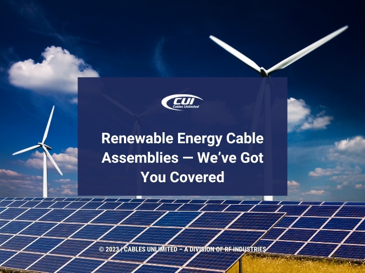 Featured; Wind Farm Stands Behind Solar Generation Panels On Sunny Day- Renewable Energy Cable Assemblies-We'Ve Got You Covered