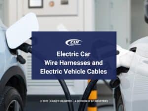 Featured: Close-up of electric vehicle at charging station- Electric car wire harnesses and electric vehicle cables