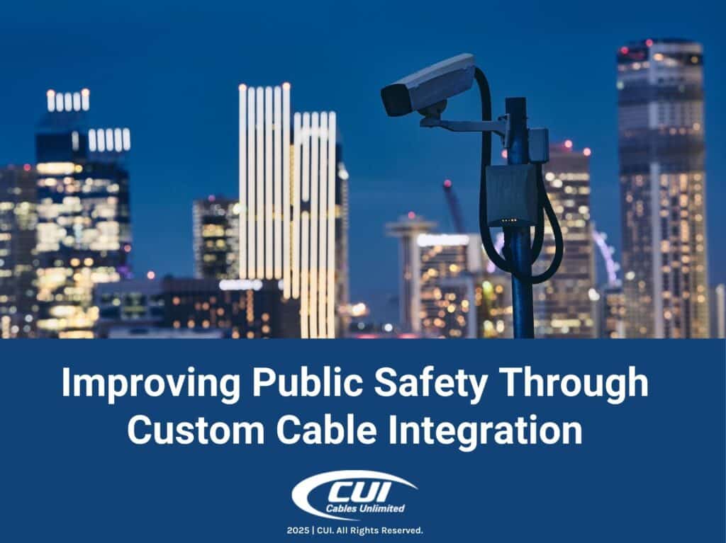 Night Cityscape With Tall Black Security Camera. Improving Public Safety Through Custom Cable Integration.
