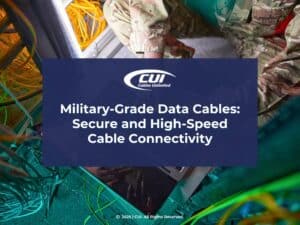 Featured: Military soldier dressed in camoflauge using laptop in server room- Military-Grade Data Cables: Secure and High-Speed Cable Connectivity