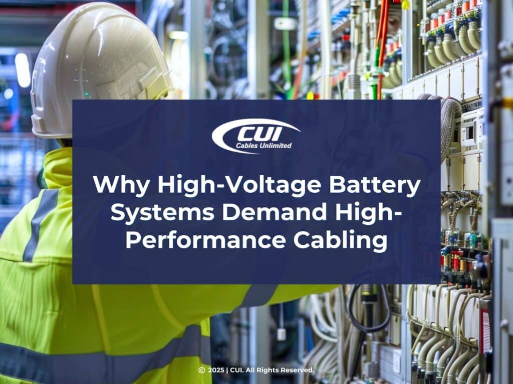 Featured: Worker In Yellow Safety Jacket Working On Electrical Panel- Why High-Voltage Battery Systems Demand High-Performance Cabling.