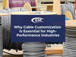 Large stacked spools of colored cables- Why Cable Customization Is Essential for High-Performance Industries.