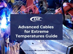 Robotic arms welding metal in industrial setting. Article title.