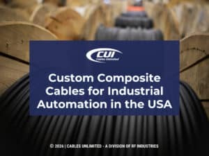 Thick, black cables wound on large wooded spools. Article title.